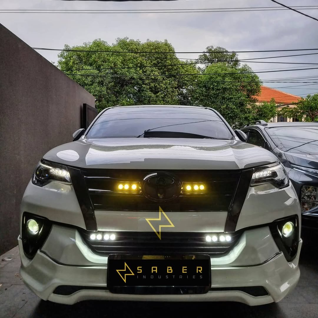 Mini Proji: Lampu Tembak yang Berubah dari Aksesori Tambahan Menjadi Identitas Modifikasi